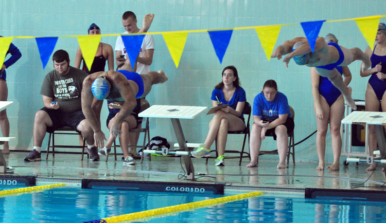 Swimmers Set School Record in 200 Medley Relay