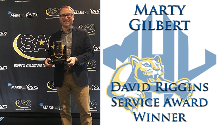 Marty Gilbert receives inaugural David Riggins Service Award
