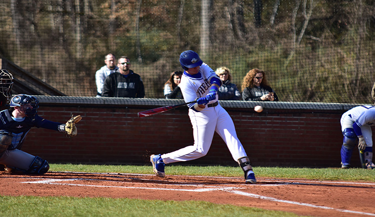 Queens rallies late, escapes Mars Hill with series win