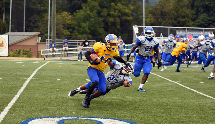 Football Holds on for a 42-39 Victory at Limestone
